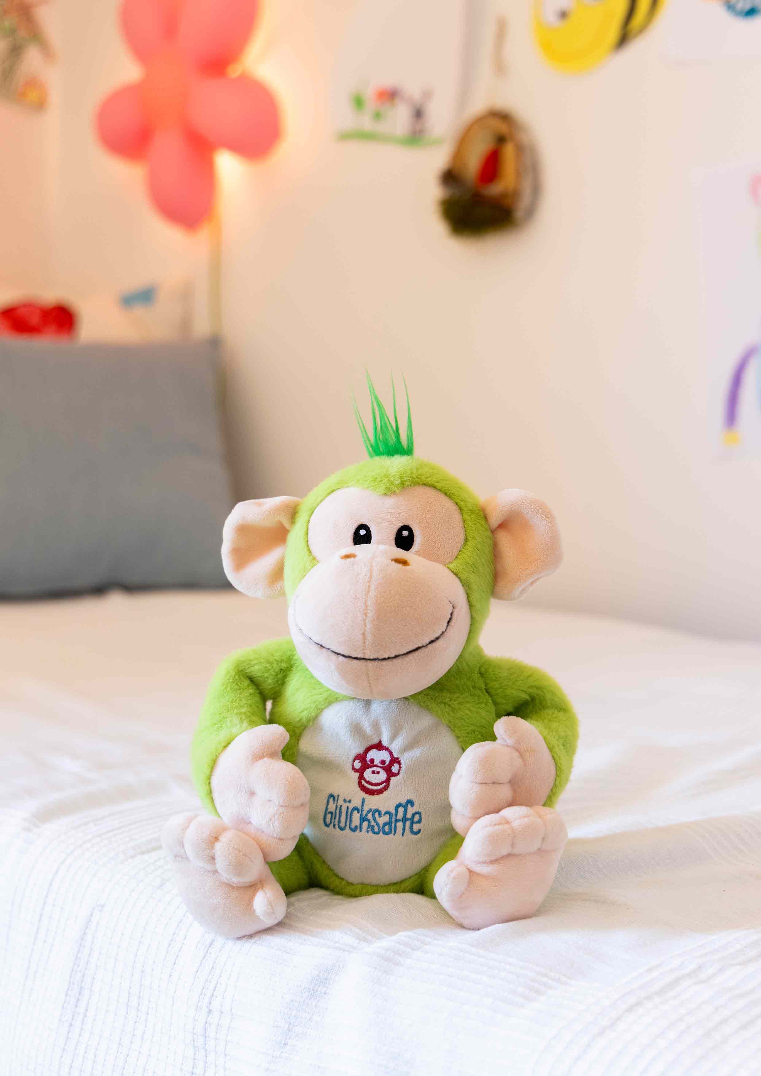 LykkeAben - den grønne bamse med lydhjerte